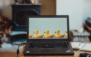 Laptop open in a living room