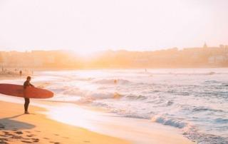 Australian beach with surfer