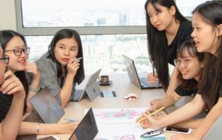 Students talking over their work